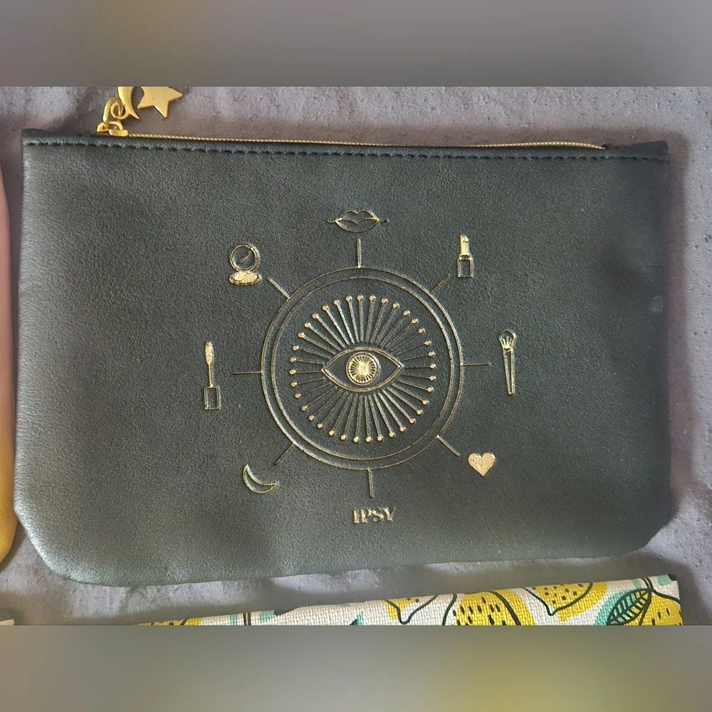 4 ipsy makeup/travel bags